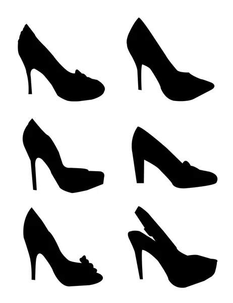 Silhouettes of black shoes — Stock Vector