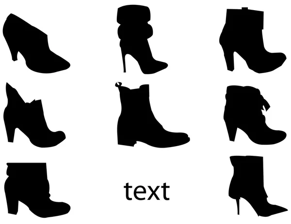 Silhouettes of black boots — Stock Vector