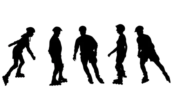 Silhouettes of inline skaters — Stock Photo, Image