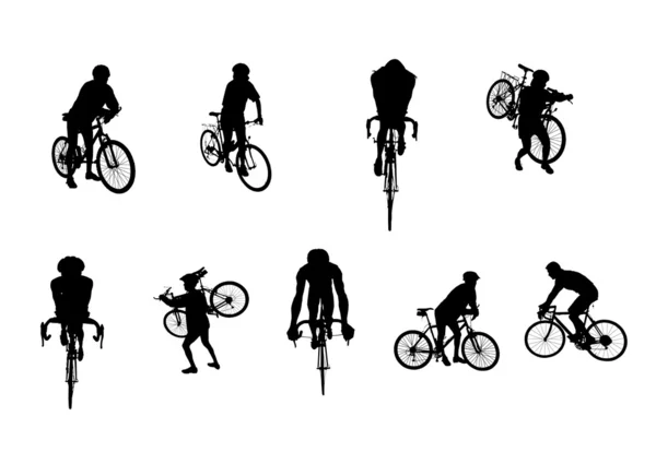 Silhouetten van fietsers — Stockfoto