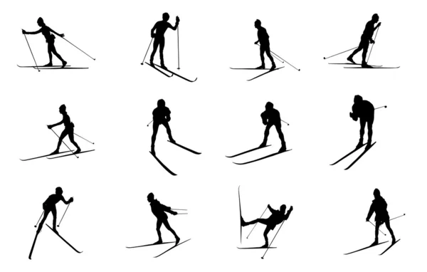 Silhouetten von Skifahrern — Stockfoto