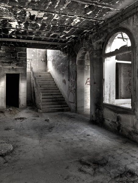 Eerie and empty hallway space in an abandoned building