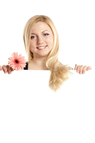 Šťastné blond s růžový květ — Stock fotografie