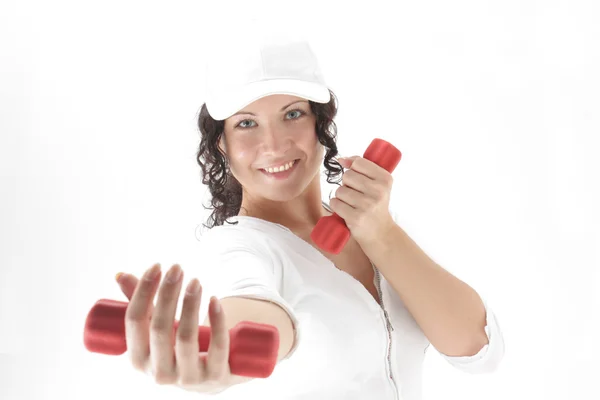 Girl with red dumbbells — Stock Photo, Image