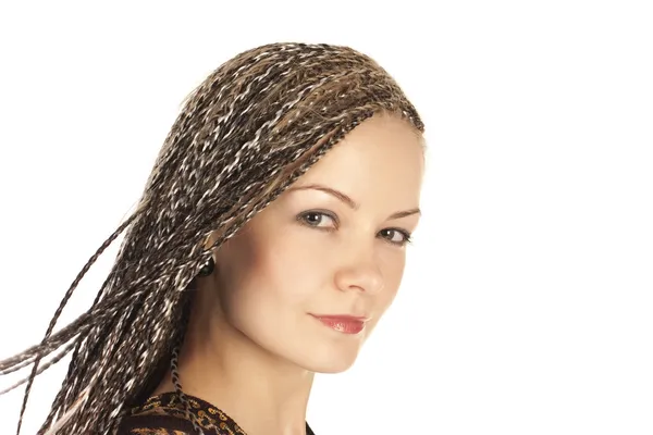 Beautiful young woman with braids — Stock Photo, Image