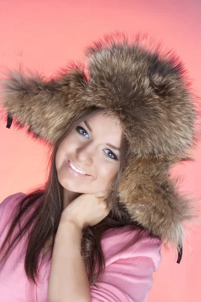 Chica en una gorra con orejeras —  Fotos de Stock