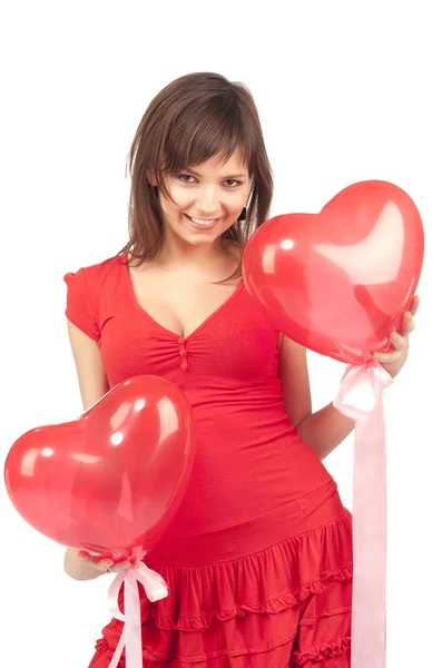 Kobieta z czerwonym sercem balon — Zdjęcie stockowe