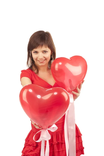 Mulher com balão de coração vermelho — Fotografia de Stock