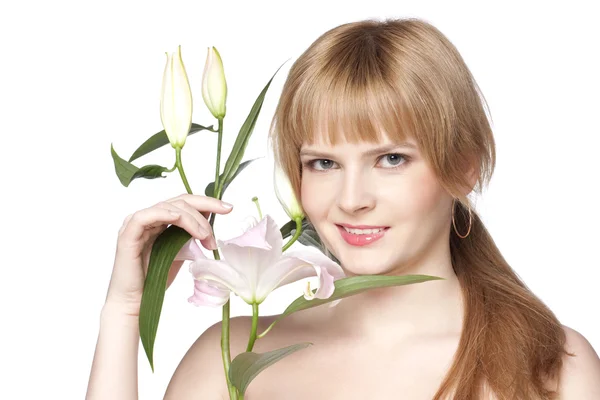Women with a lily flower — Stock Photo, Image