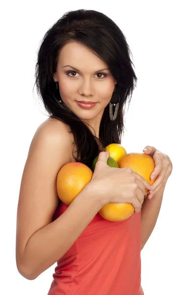 Linda morena com citrinos — Fotografia de Stock