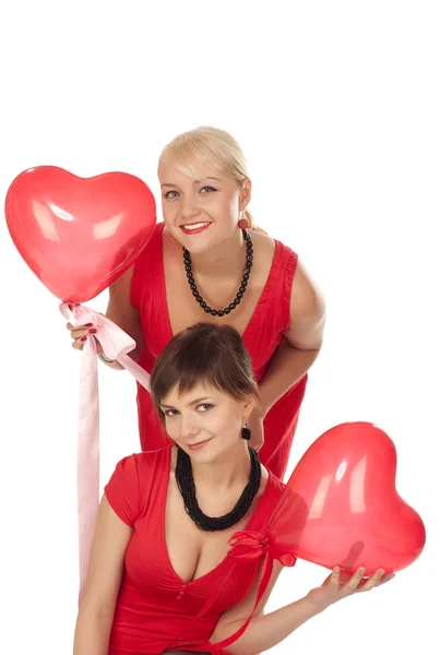 Flickor med rött hjärta ballong — Stockfoto