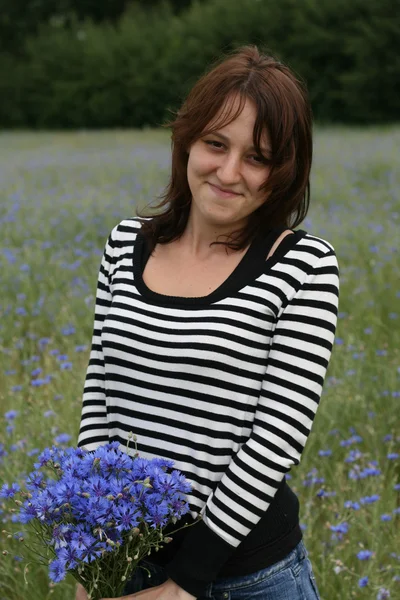 stock image Young woman with flowers