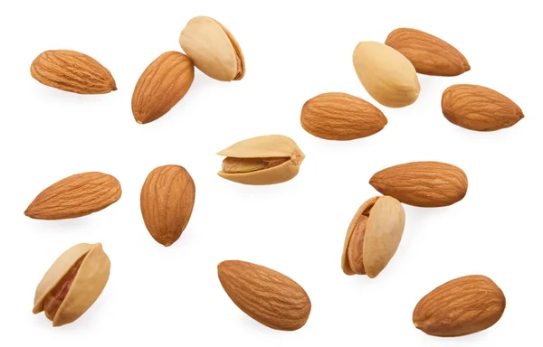 Almonds and pistachios are scattered — Stock Photo, Image