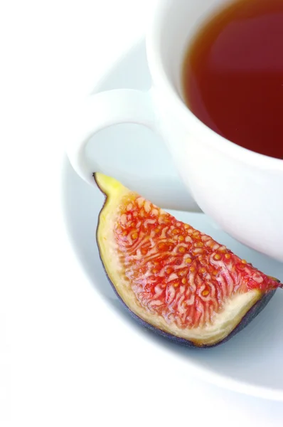 Tea cup and fig fruit — Stock Photo, Image