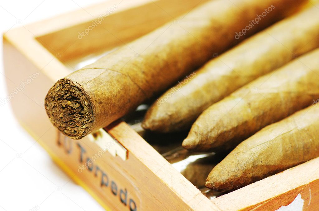 Cigars are in a box. Cigars close up.