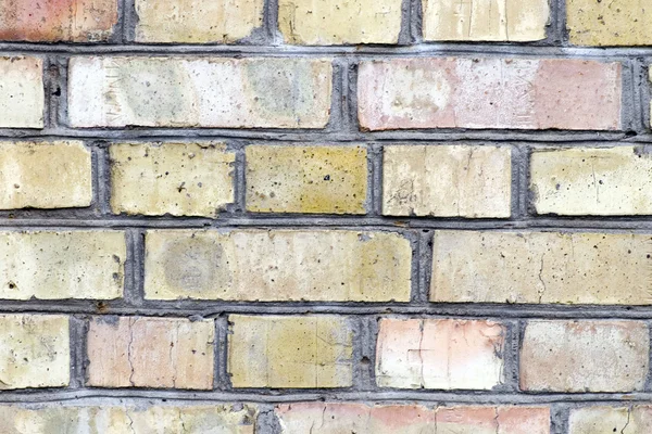 Textura de pared de ladrillo viejo en la luz solar — Foto de Stock