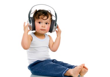 Baby with headphones. clipart