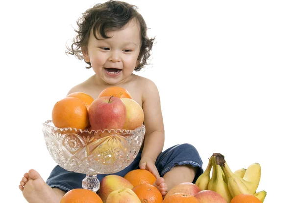 Baby med frukter. — Stockfoto