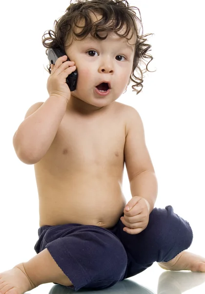 Baby with telephone. — Stock Photo, Image