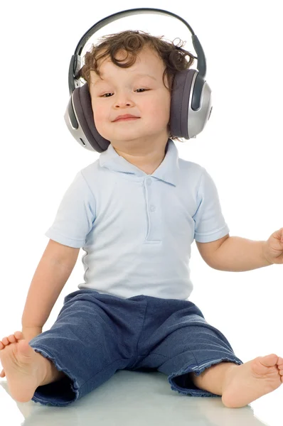 Дитина з навушниками . — стокове фото