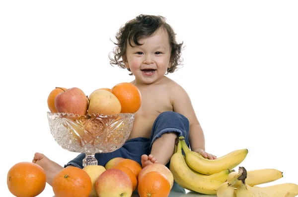 Baby with fruits. — Stock Photo, Image