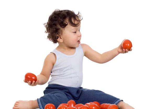Bambino con pomodoro . — Foto Stock