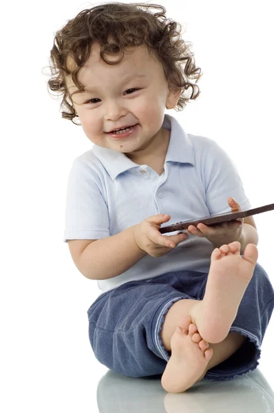 Child with chocolate. — Stock Photo, Image