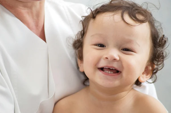 Happy baby at the doctor. — Stock Photo, Image