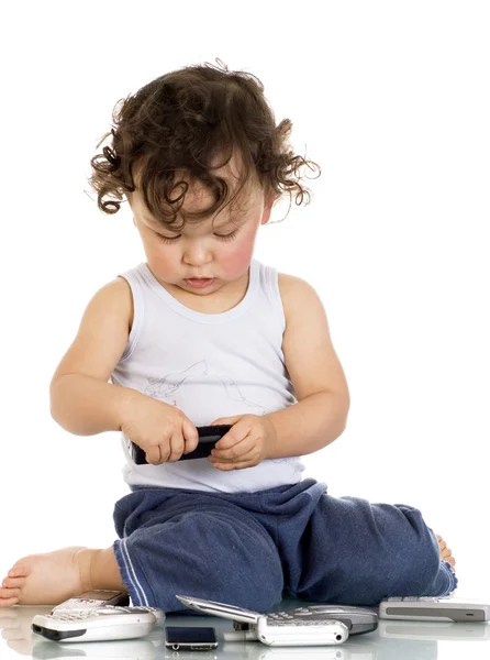 Niño con teléfonos móviles . — Foto de Stock