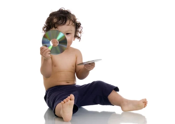 Baby med disk. — Stockfoto