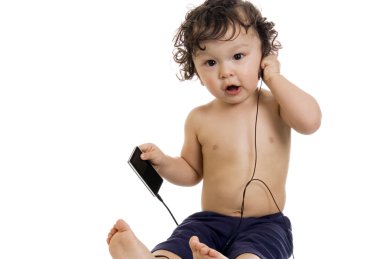 Baby with mp3 player. clipart