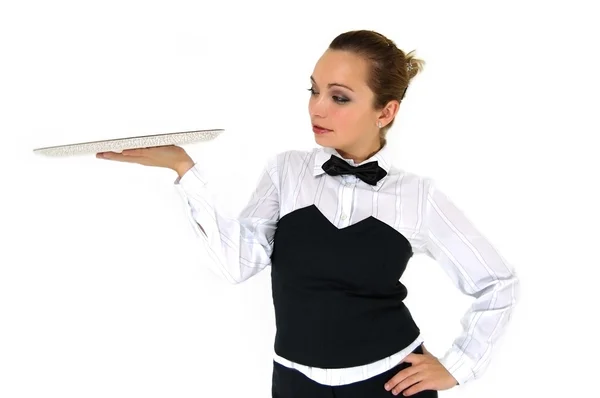 Офіціантка в уніформі і краватка тримає лоток ізольовано на білому — стокове фото