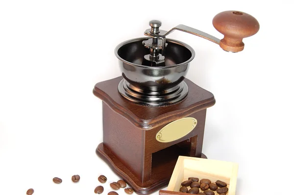 Coffee grinder with beans isolated on white Stock Picture