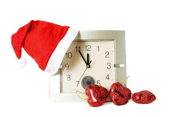 Santa cap on clock — Stock Photo, Image