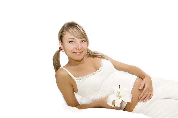 Mulher grávida com flor — Fotografia de Stock