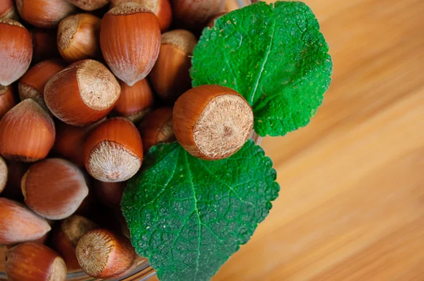 Some hazelnuts with leaves — Stock Photo, Image