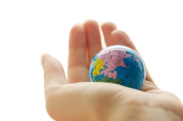 Globe v lidské dlaně — Stock fotografie