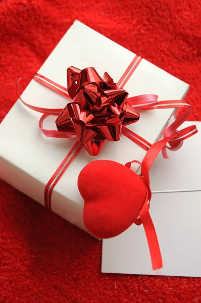 Gift box and fabric heart — Stock Photo, Image