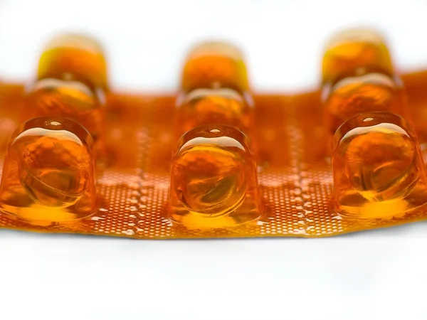 Yellow pills close-up — Stock Photo, Image