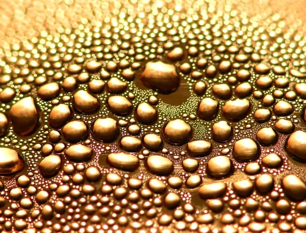 Gold water drops — Stock Photo, Image