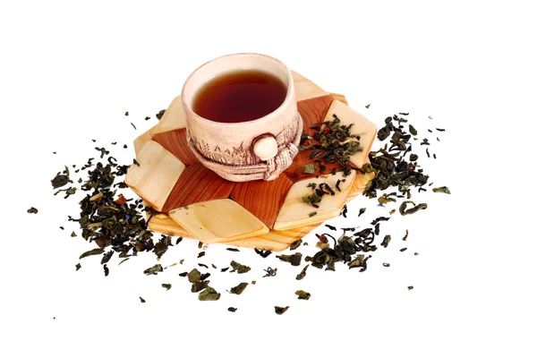 Una tazza di tè su un supporto di legno — Foto Stock