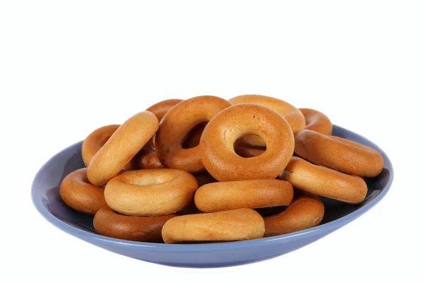 Donuts on a blue saucer — Stock Photo, Image