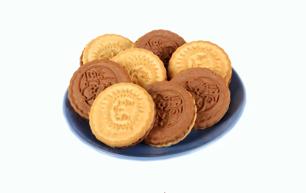 Shortbread two colors on a blue saucer — Stock Photo, Image
