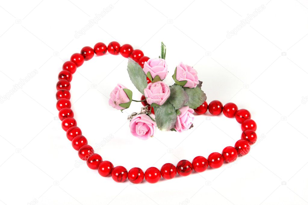 Coral beads with a bouquet of pink roses