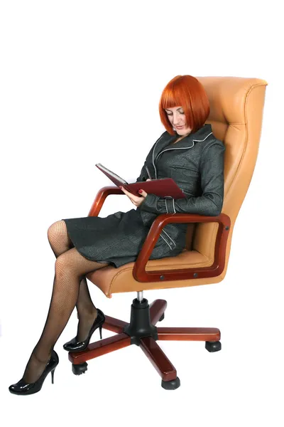 Iş kadını bir ofis koltuğu — Stok fotoğraf