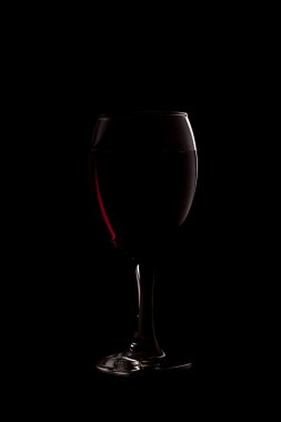 Red wine on black background clipart