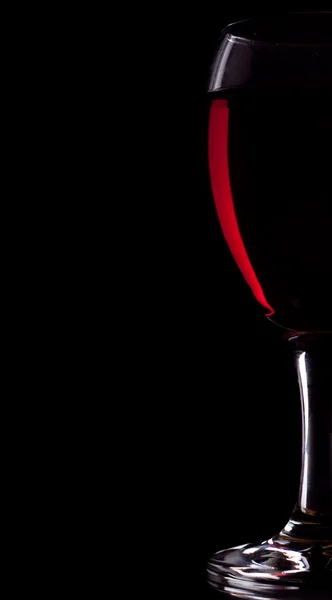 Halvt glas og rött vin — Stockfoto