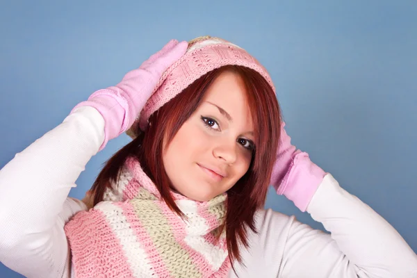 Portrait of girl in pink scarf and hat — Stock Photo, Image
