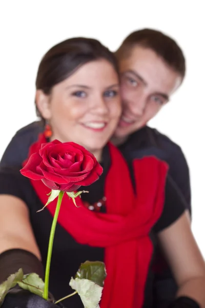 Smiling couple and one red rose — Stock Photo, Image