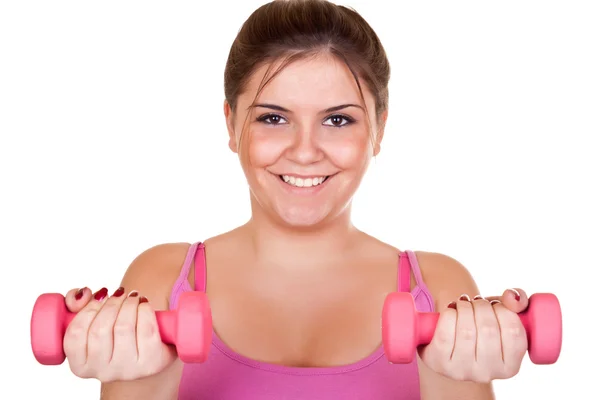 Glimlachend meisje bedrijf gewicht — Stockfoto